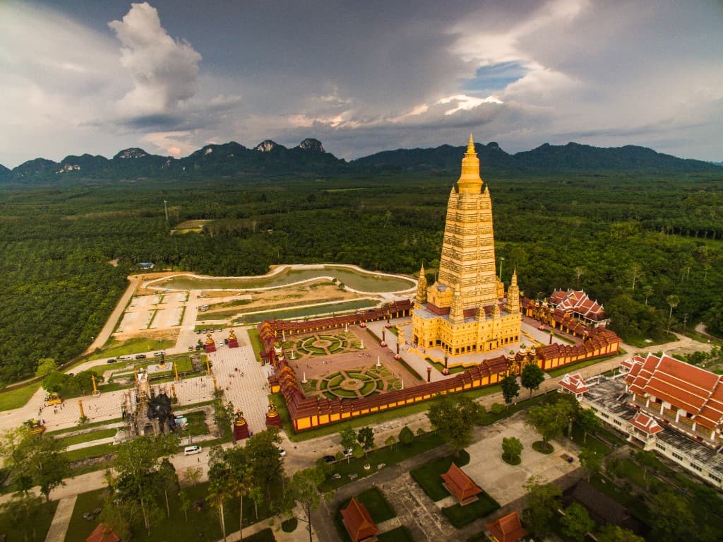 Wat Bang Thong golden chedi and temple grounds near Krabi — scooter day trip